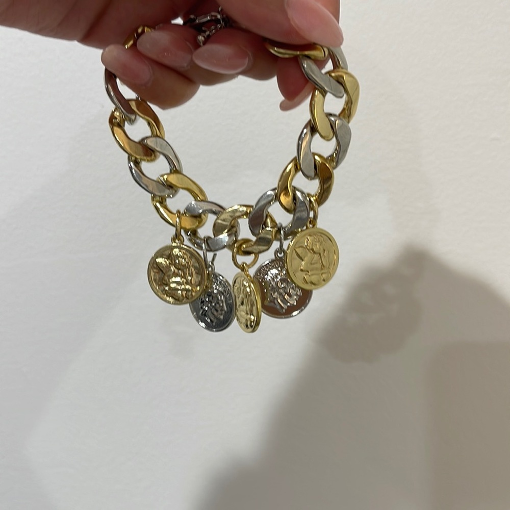 Kendall and Kylie gold and silver watch+ bracelet set.
